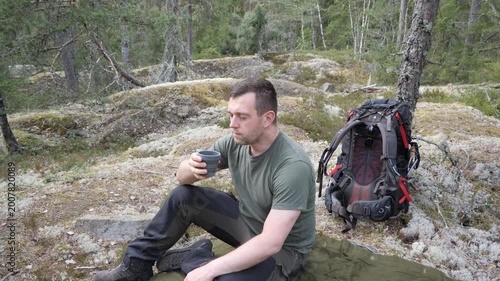Hiker Drinking Coffee During Forest Trekking Break