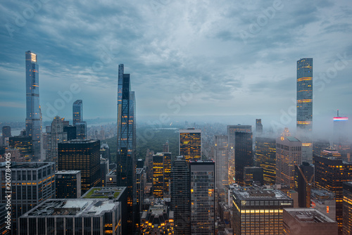Moody Blue Hour Aerial View of the Manhattan Skyline and Central Park with Low Clouds in New York City