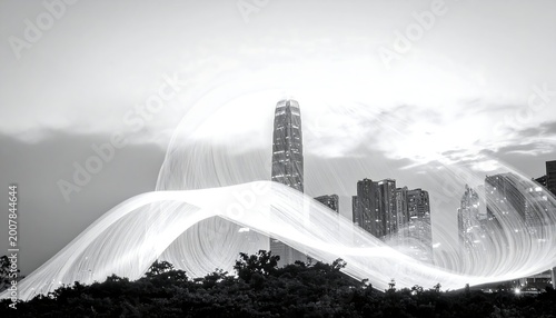 Black and White Cityscape with Skyscrapers and Light Trails