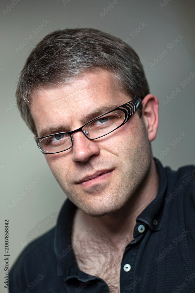 Obraz premium Portrait of a young man inside house