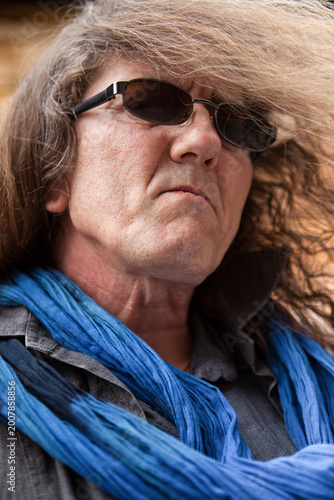 Portrait of a long hair old man