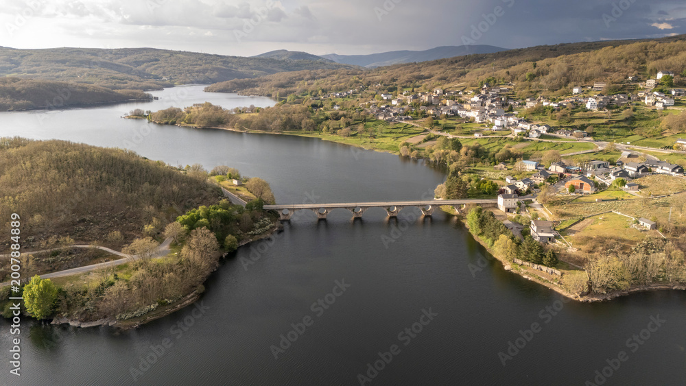 Fototapeta premium Encoro de prada reservoir with bridge, a veiga, spain