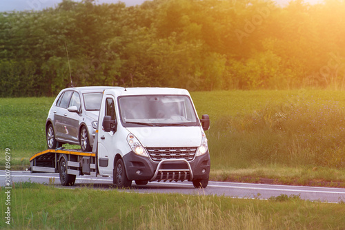 Tableau sur toile Roadside breakdown recovery during highway traffic
