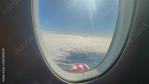 Tranquil Ascent Over Vast Cloud Landscapes. Gentle Voyage Through Luminous Sky With Sprawling Cloud Fields. Serene Ascent Soaring Above Expansive Cloud Formations Illuminated By Sunlight