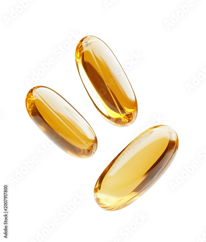 Three golden fish oil softgel capsules isolated on a transparent background studio shot.