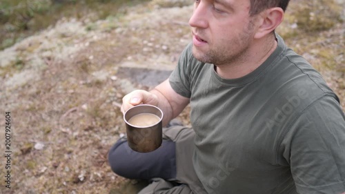 Man Drinking Coffee Outdoors During Camping Trip
