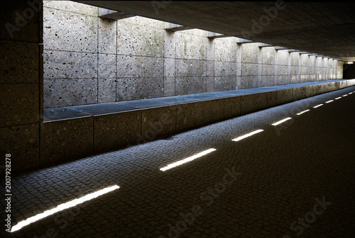 Modern Concrete Underpass: Rhythmic Light and Shadow Play