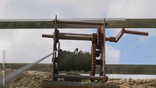 Antique Water Well Mechanism with Wound Rope and Winding Handle