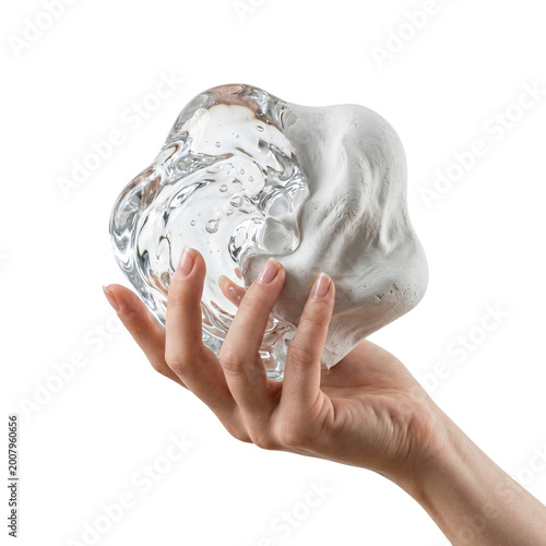 Human hand holding a translucent amorphous blob of clear gel and white clay on transparent background.