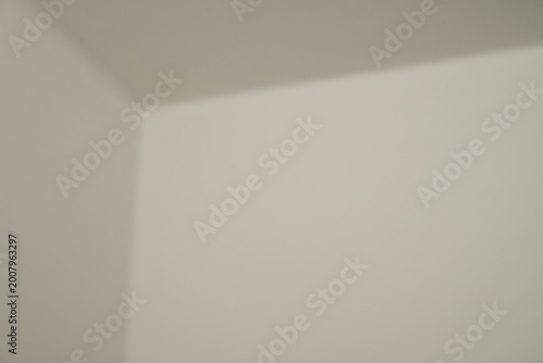 Bright Wall Texture With Smooth Lighting And Subtle Shadow Detail