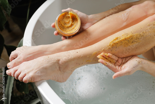 Exfoliating Body Scrub Treatment for Smooth Skin in Bathtub