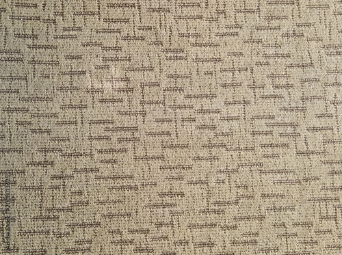 Geometric pattern beige carpet texture for interior design background