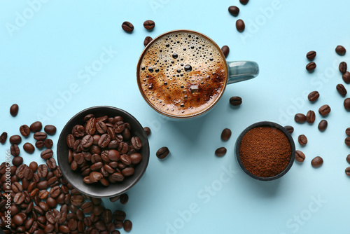 Cup of coffee with beans an...
