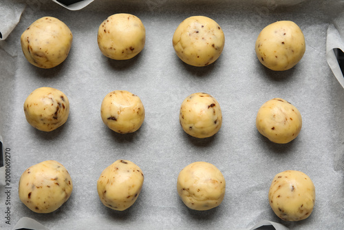 Baking tray with uncooked c...