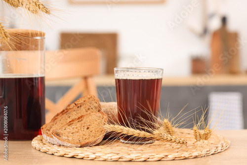 Jug of tasty kvass with gla...