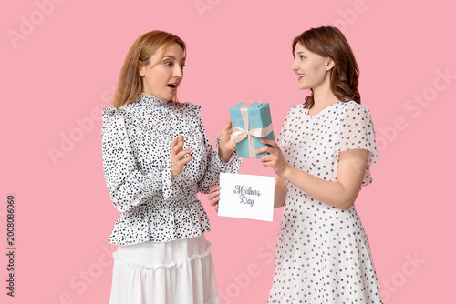 Surprised mature woman with...