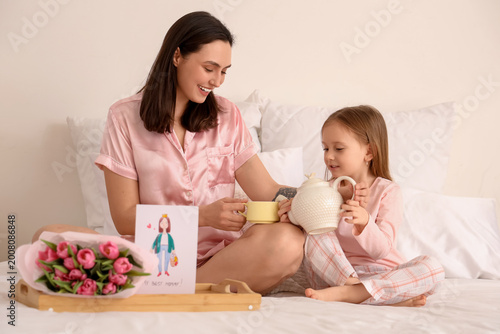 Happy mother with her cute ...