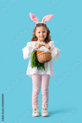 Cute little girl in bunny e...