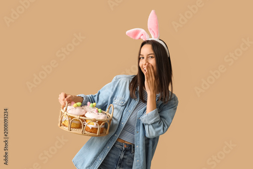 Pretty young woman with bun...
