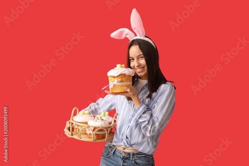 Pretty young woman with bun...
