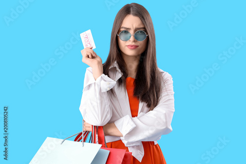 Thoughtful young woman with...