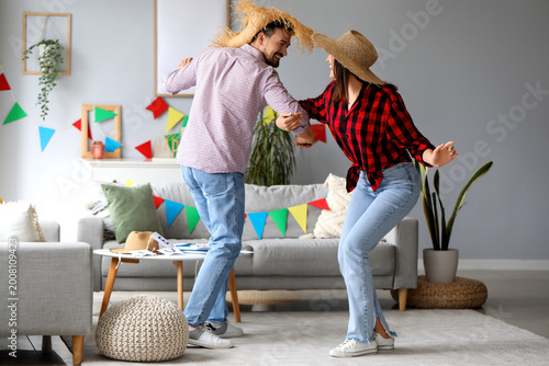 Young couple celebrating Fe...