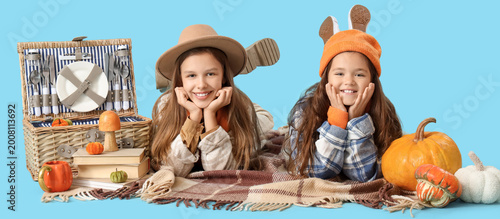 Cute girls in autumn clothe...