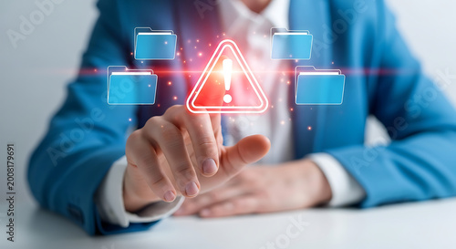 Hand points to a glowing red warning icon, symbolizing critical data security threats, cyber risks, and urgent digital information protection