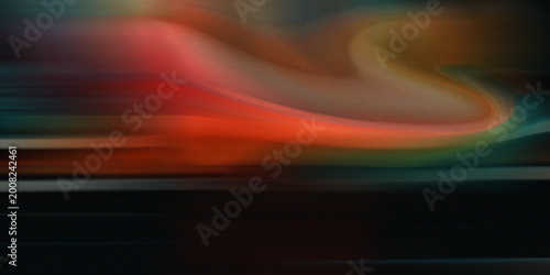 Photography Dynamic and vivid abstract background featuring swirling lines of red, orange, blue, and green colors with motion blur effect