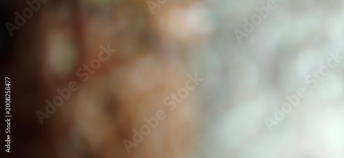 Foto Abstract background with soft blurred textures in light brown and white tones fo
