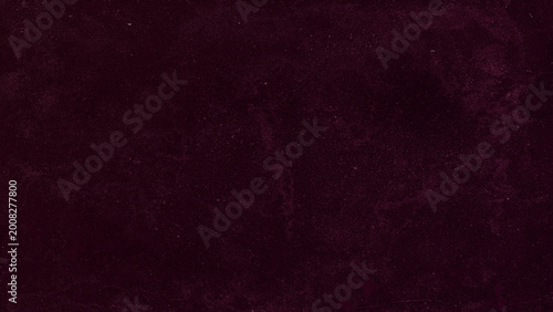 Dark burgundy textured background with subtle grunge finish, elegant abstract surface ideal for modern design, luxury and sophisticated compositions.