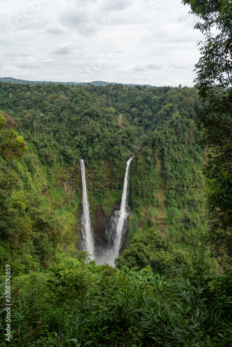 Photography Tad Fane waterfall framed by jungle Bolaven Plateau Laos