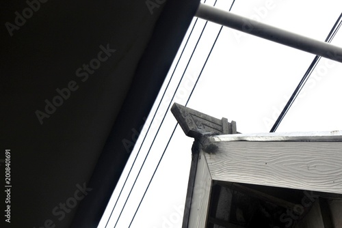 Fotografie The gable roof of a traditional building with decorations made of cement at the