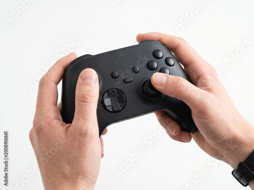 hand holding video game controller