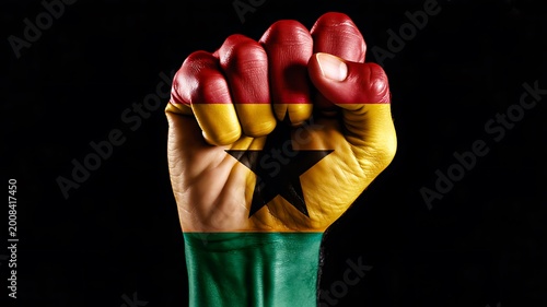 Raised fist painted with ghana flag colors symbol of unity strength and national pride