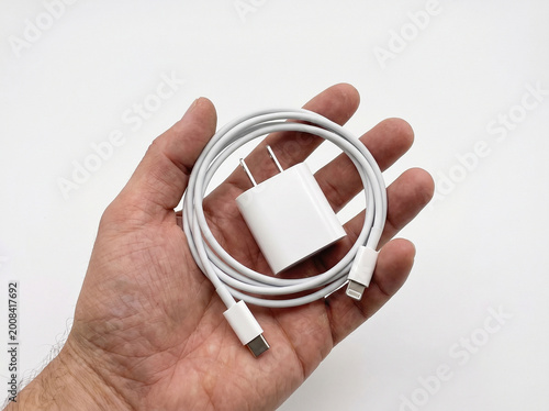 hand holding charger