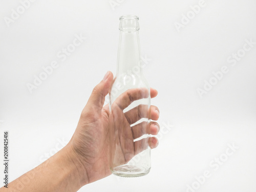 hand holding a glass