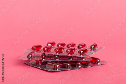 too many different pill cartridges stacked. selective Focus. Packs of blister pills with tablets. Colored pastilles packages. A pile of medicine in blister packs. Pharmaceutical blister packs