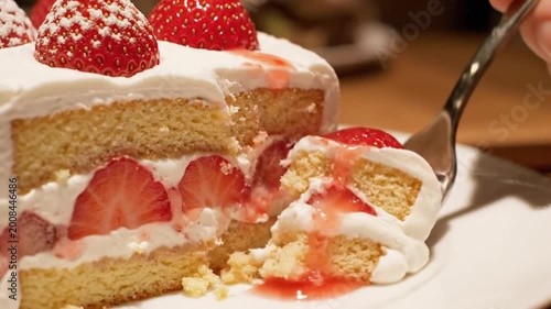Delicious Strawberry Shortcake with Cream and Fork - Close Up