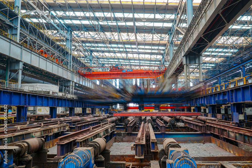 Fototapeta premium The fiery steel billet, the core moment of the rolling mill production line