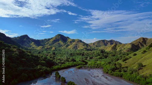 Komodo island natural landscape hills, green forest. Nice aerial view drone