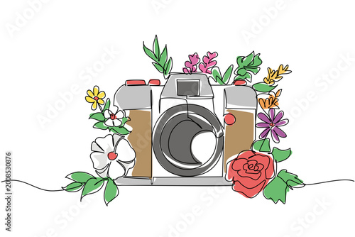 Tinted continuous line drawing of a camera surrounded by beautiful blooming flowers. This nature concept is an absolutely perfect fit for Nature Photography Day greeting cards design.