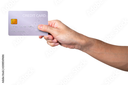 A close-up man hand holds a silver card isolated on white background with a clipping path.