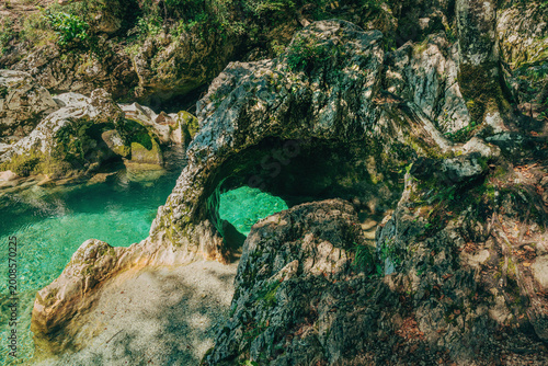 Natural rock formation known as Little Elephant in the crystal-clear Mostnica river gorge, Slovenia.