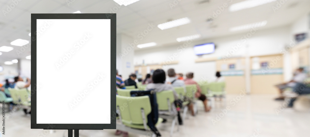 Obraz premium Blank Vertical Sign Mockup in Hospital Waiting Area Interior