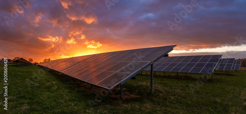 Photovoltaic power plant during a spectacular sunset