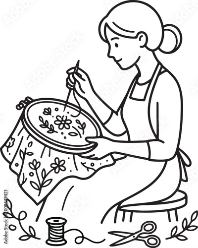 Woman sewing flowers on fabric with needle and thread