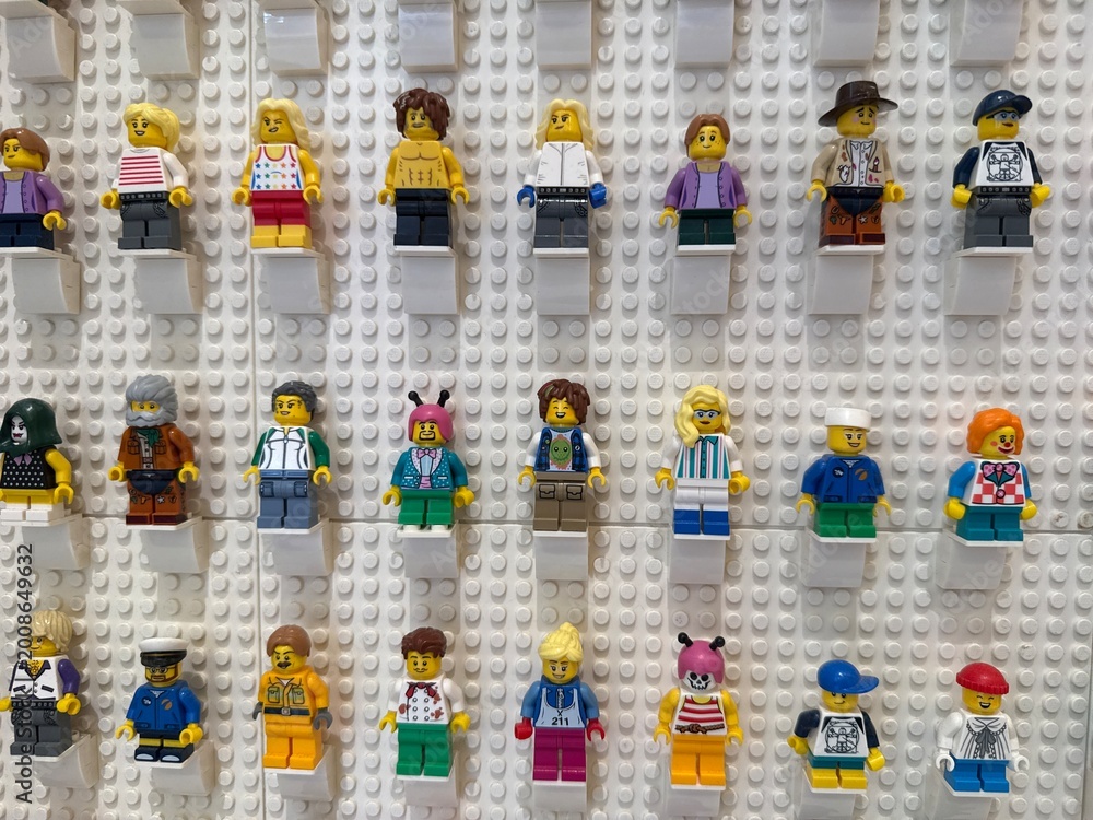 Fototapeta premium April 2026, Singapore: LEGO minifigures on a white wall