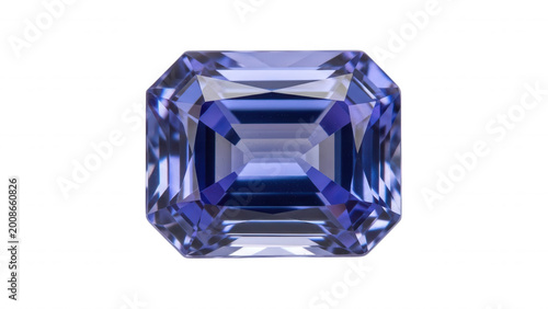 Emerald cut tanzanite gemstone with deep blue and violet facets isolated on a solid black background, showing geometric symmetry and
