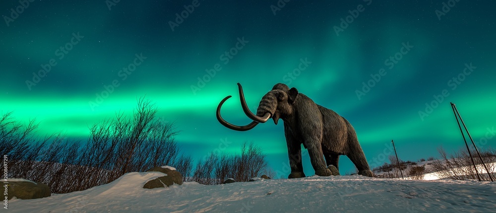 Fototapeta premium Arctic scenery. A mammoth statue with the northern lights in the background.